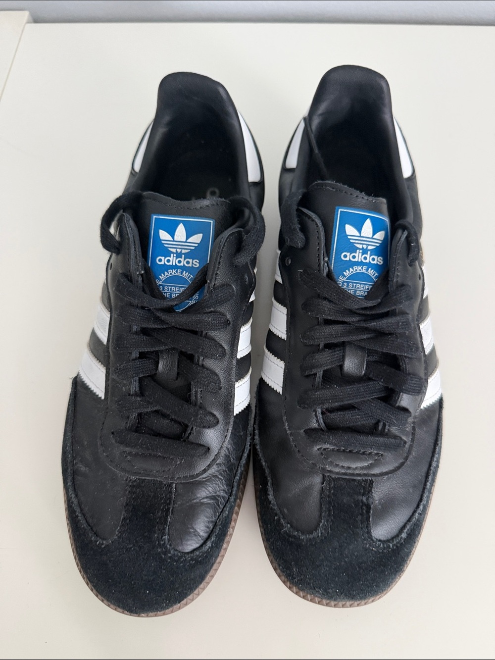 Adidas Samba OG sneakers black leather upper iconic white stripes a gum rubber